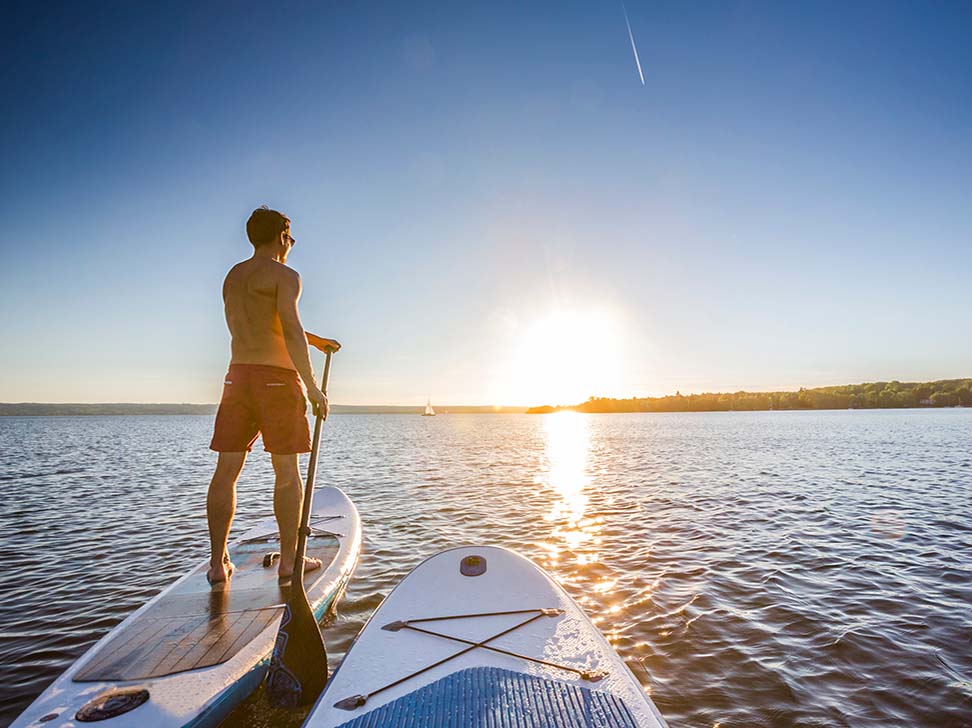 Choosing the best paddleboard 2 boards in the sea